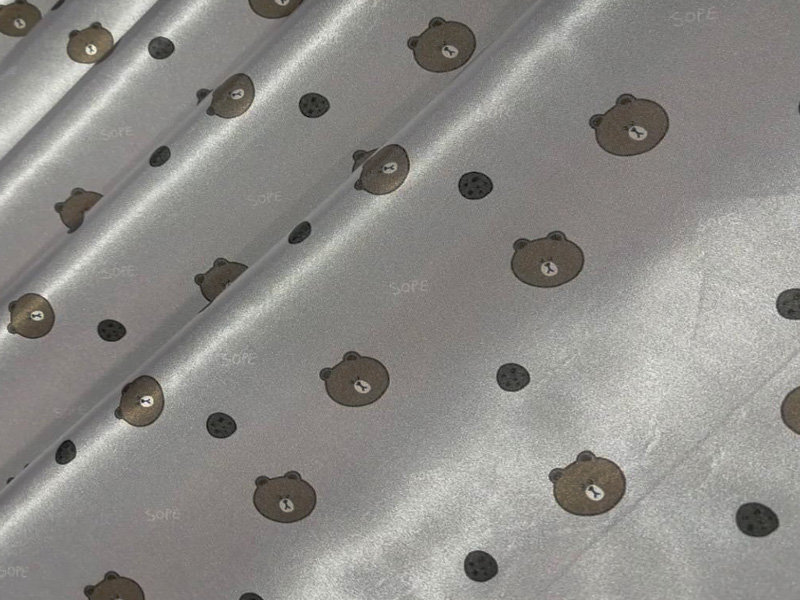 پارچه ساتن طرح   خرسی بژ